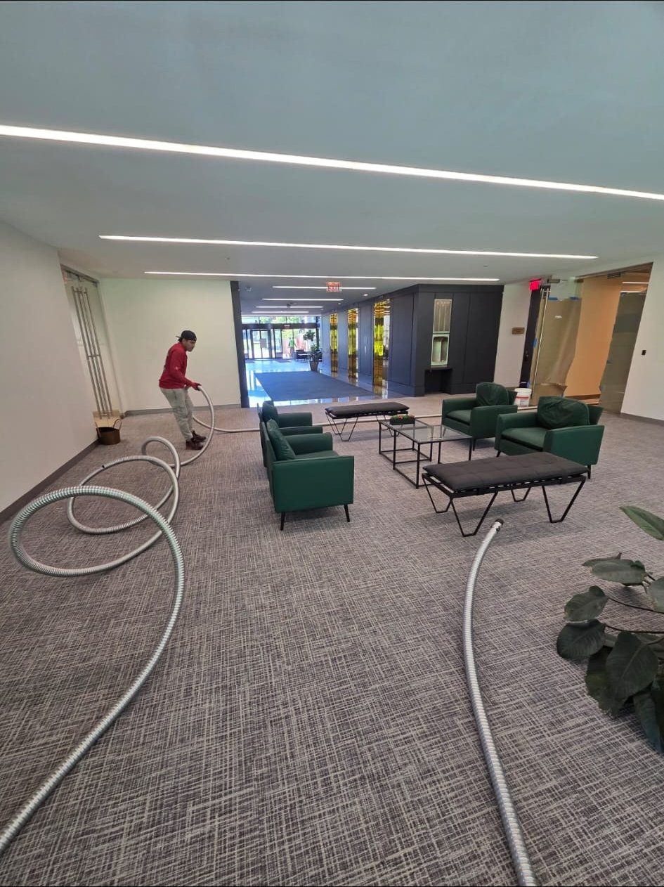 Commercial lobby with linear LED lighting and feeder cable laid out