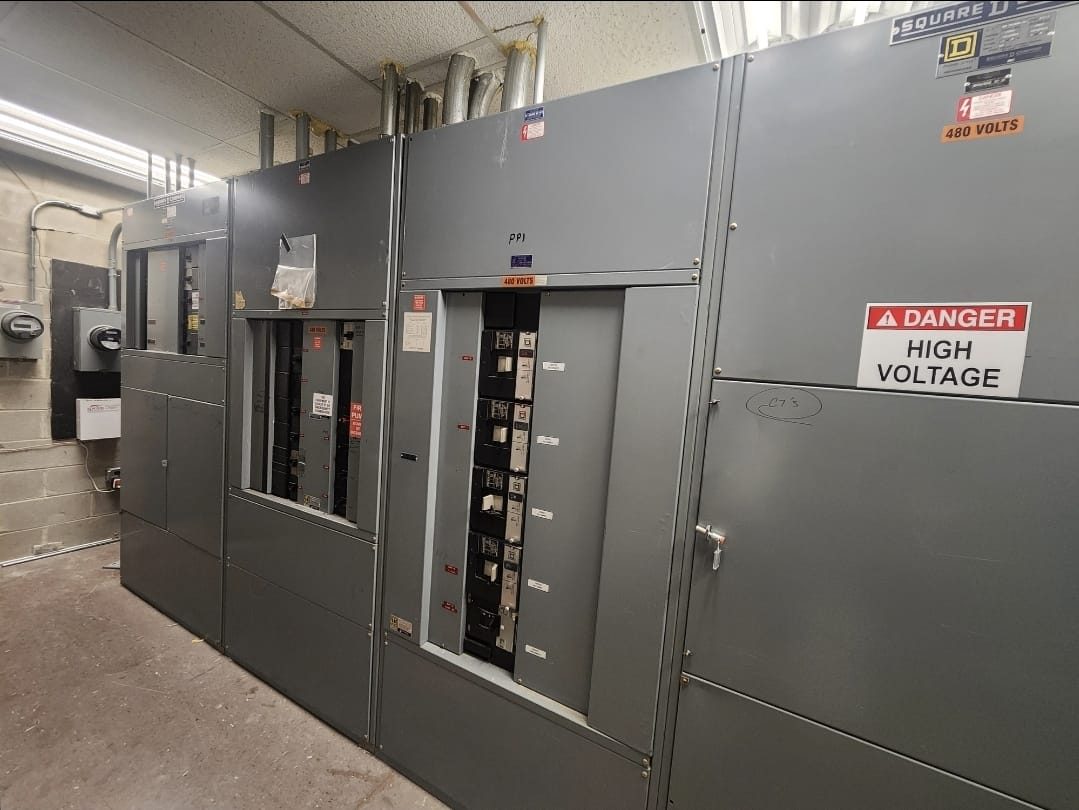 480 volt switchgear lineup in a commercial electrical room